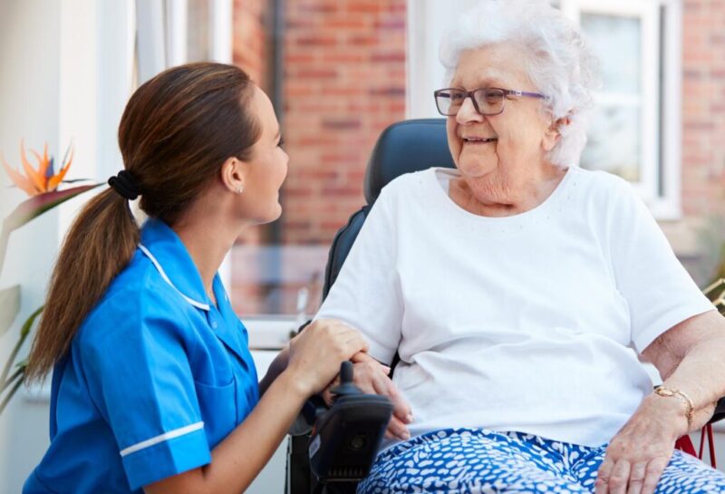 Image of a nurse and patient
